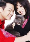 欧锦棠夫妇与爱猫拍写真呼吁社会对宠物更关爱