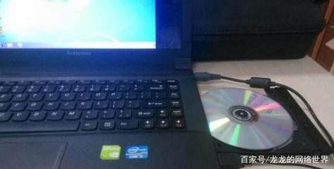 光盘怎样放入电脑