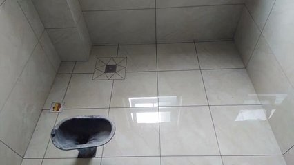 卫生间地漏地砖铺法